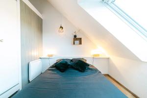 Postel nebo postele na pokoji v ubytování Confort et modernité au cœur de l'Aubrac