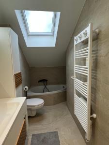 Et badeværelse på Résidence Nova + 16 billeder