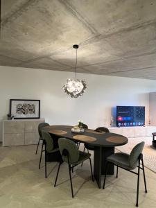 Et tv og/eller underholdning på Résidence Nova