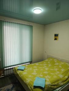 Ένα ή περισσότερα κρεβάτια σε δωμάτιο στο My home