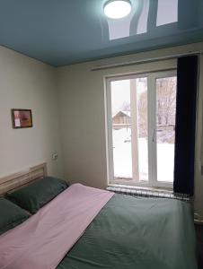 Ένα ή περισσότερα κρεβάτια σε δωμάτιο στο My home