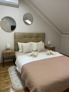 Ένα ή περισσότερα κρεβάτια σε δωμάτιο στο Villa Oaza +12 φωτογραφίες