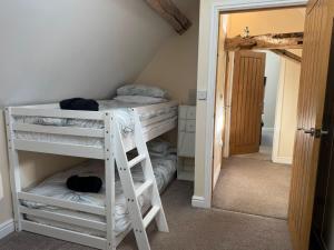 Voodi või voodid majutusasutuse The Stable at Woodland Forge toas