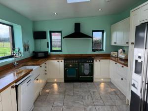 Köök või kööginurk majutusasutuses The Stable at Woodland Forge +29 fotot