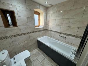 Vannituba majutusasutuses The Stable at Woodland Forge