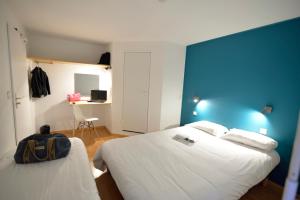 Postel nebo postele na pokoji v ubytování Fasthôtel Limoges Nord - FH Confort