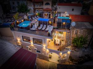 an aerial view of a house with a swimming pool at Villa Iasonas in Kournás