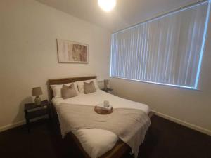 Postel nebo postele na pokoji v ubytování Pudding Chare Apartments + 17 fotografií