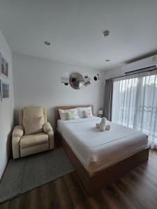 Ένα ή περισσότερα κρεβάτια σε δωμάτιο στο La Habana Huahin by J2A +52 φωτογραφίες