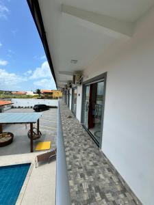 a view from the balcony of a house at Isadora Pousada in Salinópolis