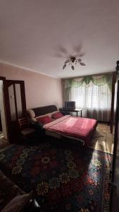 Giường trong phòng chung tại Hostel Apartament