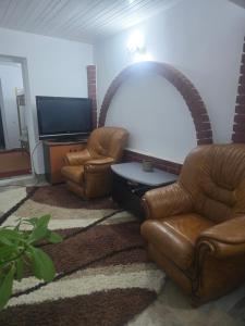 Телевизор и/или развлекательный центр в Casa Elena