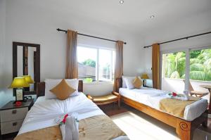 Voodi või voodid majutusasutuse Yasad Residence toas