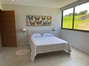 Postel nebo postele na pokoji v ubytování Casa MarSol