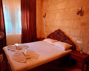 En eller flere senge i et værelse på Bella Vista Stone House + 9 billeder