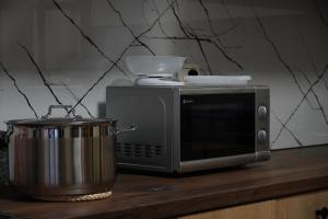 Kuchyň nebo kuchyňský kout v ubytování Balkan Hostel