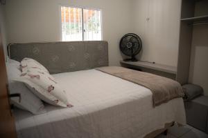 Ένα ή περισσότερα κρεβάτια σε δωμάτιο στο Casa Bosque da Serra +16 φωτογραφίες