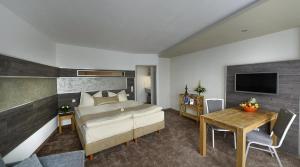 Ένα ή περισσότερα κρεβάτια σε δωμάτιο στο Center Hotel Essen