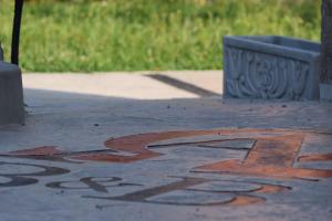 a drawing on the ground on a sidewalk at B&B Battista in Sacile