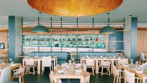 Restaurant ou autre lieu de restauration dans l'établissement Pedras do Mar Resort & Spa