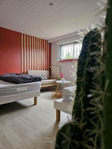 Ένα ή περισσότερα κρεβάτια σε δωμάτιο στο Studio confort chez Lolita et Wilfried