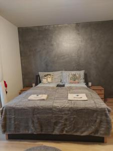 Ένα ή περισσότερα κρεβάτια σε δωμάτιο στο Sandra