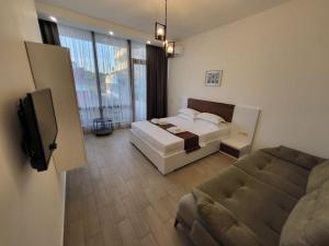 TV a/nebo společenská místnost v ubytování Hotel saba