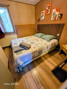 Postel nebo postele na pokoji v ubytování Le petit coin au bord du lac