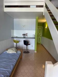 Postel nebo postele na pokoji v ubytování Le Joyeux