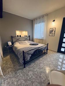 Llit o llits en una habitació de D-Living2 Casa Vigevano