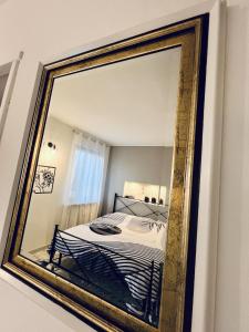 Llit o llits en una habitació de D-Living2 Casa Vigevano 4 fotos més