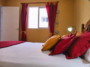 En eller flere senge i et værelse på Depto PAR