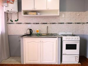 Køkken eller tekøkken på Depto PAR + 7 billeder