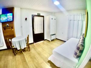 Et tv og/eller underholdning på Pousada Aargau