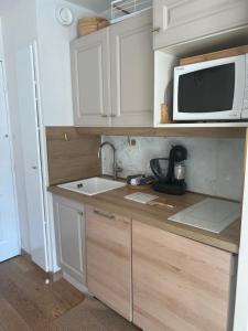 Η κουζίνα ή μικρή κουζίνα στο 5 personnes, 2Pieces exceptionnel havre de détente et de confort, immense terrasse, vue incroyable, Tout pédestre, à 10m du funiculaire, parking