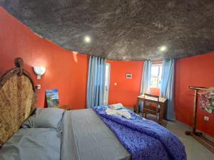 Ένα ή περισσότερα κρεβάτια σε δωμάτιο στο Funco Du Santos