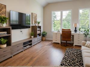 a living room with a large television and a desk at Stylish Urban Escape in Downtown Los Angeles in Los Angeles +45 photos