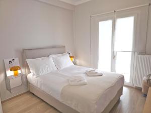 Ένα ή περισσότερα κρεβάτια σε δωμάτιο στο F15teen Urban Living