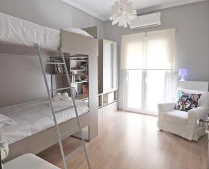 Ένα ή περισσότερα κρεβάτια σε δωμάτιο στο F15teen Urban Living