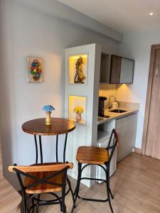 Kuchyň nebo kuchyňský kout v ubytování Apart Pedra Azul