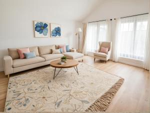 a living room with a couch and a table at Stylish Urban Escape in Downtown Los Angeles in Los Angeles