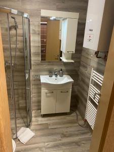 Et badeværelse på Hedonizam Jahorina 2 + 3 billeder