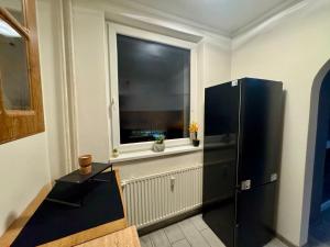Køkken eller tekøkken på Cozy apartment