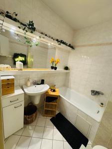 Et badeværelse på Cozy apartment