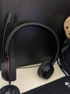 a pair of headphones sitting on a desk at Upskill Coworking Space in Marilao +2 photos