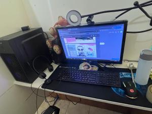 a laptop computer sitting on top of a desk at Upskill Coworking Space in Marilao