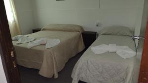 Ένα ή περισσότερα κρεβάτια σε δωμάτιο στο Suteryh