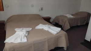 Ένα ή περισσότερα κρεβάτια σε δωμάτιο στο Suteryh