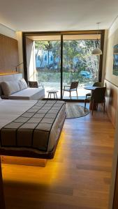 Postel nebo postele na pokoji v ubytování Hotel Vila Inglesa