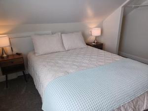 Ένα ή περισσότερα κρεβάτια σε δωμάτιο στο WYO Summer Sanctuary